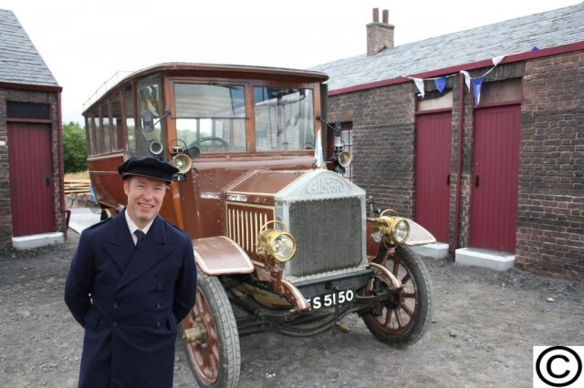 Brian Craigie in front of the Pride on set.